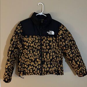 The North Face Black and Gold Leopard Print Puffer Jacket